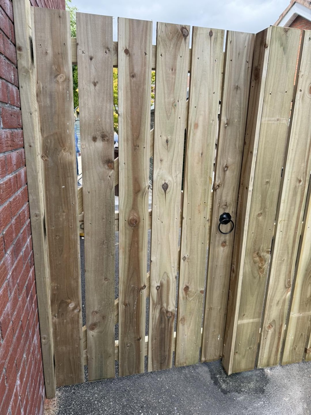 Garden gate after repair, rehung and finished